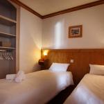 Slide la chambre avec 2 lits simples