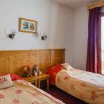 Slide Chambre lits simples d'un des logements