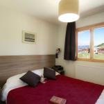 Slide Chambre lit double d'un des logements
