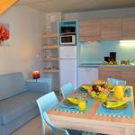 Slide Living room of  La Grenadine cottages in Marseillan