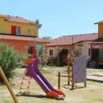 Slide Play area of  La Grenadine cottages in Marseillan