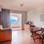 Slide Residence Sognu di Rena - Moriani - Living room with sea view