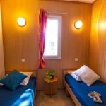 Slide Camping Les Chalets de la mer - chambre