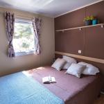 Slide Camping l'Arquet**** Martigues mobil home Premium chambre