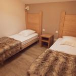 Slide Chambre avec deux lits simples à la Résidence Les Grandes Feigne à La Bresse
