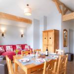 Slide stay in an apartment for 6 people with sofa and dining table at the Ours Blanc residence