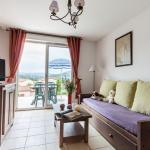 Slide Living room in the cottages at the Domaine des Cazlles in Cajarc with terrace view