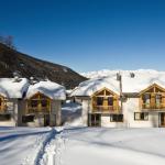 Slide Overview of La Combe d'Or residence in Les Orres 1800 under the snow