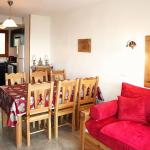 Slide Dining room in a mountain apartment at La Combe d'Or residence in Les Orres 1800