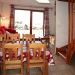 Slide Dining room in a duplex apartment in the mountains at the La Combe d'Or residence in Les Orres 1800