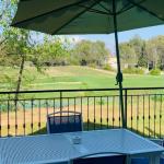 Slide Grande terrasse avec mobilier de jardin et vue sur le Golf de la Cabre d'Or à Cabiès depuis les maisons by Ateya