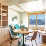 Slide Stay in a modern flat at the Le Beauregard residence in Doucy