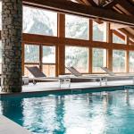 Slide Heated indoor pool at Les Hauts de la Vanoise residence in Pralognan