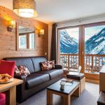 Slide Living room and lounge with mountain view in summer from Les Hauts de la Vanoise residence in Pralognan