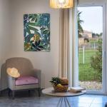 Slide Garden view from the living room of family villas at Domaine du Golf by Ateya
