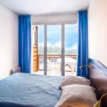 Slide Chambre double avec accès au balcon et vue sur les montagnes