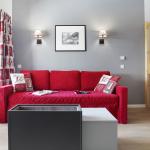 Slide Salon avec canapé dans un appartement de la résidence Aquisana