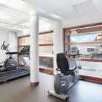 Slide Salle de sport avec machine de cardio à la résidence Aquisana