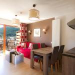 Slide Living area with dining space and open kitchen at the Aquisana residence