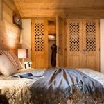 Slide Cozy double bedroom in an apartment at the Le Village de Lessy residence