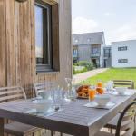 Slide Outdoor terrace at the Fleur de Sel residence with garden furniture