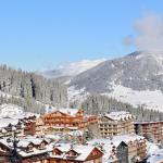 Slide Station La Tania Courchevel vue d’ensemble sous la neige