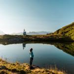 Slide Point d’eau à la station la Tania Courchevel l’été sous un couché de soleil