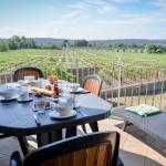 Slide Balcony overlooking the vineyards surrounding the Château de Jouarres residence in Azille