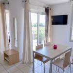 Slide Spacious lounge in the apartments of the Château de Jouarres residence in Azille