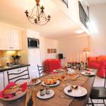 Slide Open-plan kitchen off the living/dining room in an apartment on the Bourgeac estate