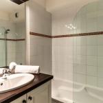 Slide Bathroom with bathtub, sink and bath towel at the Bourgeac estate