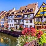 Slide Colmar and its canals located 25 minutes by car from the residence Le Domaine des Rois in Bergheim