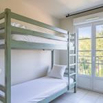Slide Chambre avec un lit superposé dans un appartement du Domaine de Camiole
