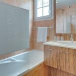 Slide Bathroom with sink and bathtub at Domaine de Camiole