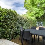 Slide Outdoor terrace with grassy corner at Domaine de Camiole
