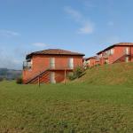 Slide Panoramic view of the buildings of La Marquisié with the countryside in the background