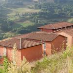Slide Rear view of the La Marquisié buildings with hills in the distance