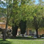 Slide Green outdoor spaces at the Le Hameau des Sources residence in Montbrun-les-Bains