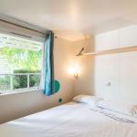 Slide First spacious double bedroom in a mobile home at Camping del Mar 4* in Malgrat de Mar