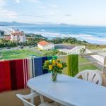 Slide Balcony with outdoor furniture in a studio at the Eugénie residence in Biarritz, with a sea view