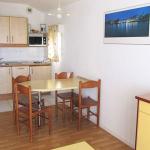 Slide Overall view of a dining space in a unit at the Ilbarritz residence