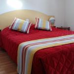 Slide Bedroom with double bed in an apartment at the Ilbarritz residence in Bidart