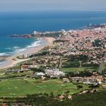 Slide Aerial view of the Ilbarritz residence in Bidart showing the residence and the ocean