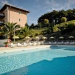 Slide Outdoor pool with sun loungers and residence buildings at Soko Eder in Ciboure