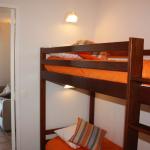 Slide Sleeping area with bunk beds in a 6-person unit at the Soko Eder residence