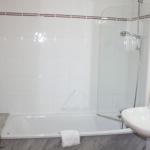 Slide Bathroom with bathtub in a Soko Eder residence apartment in Ciboure