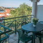 Slide Balcony with outdoor furniture in a Soko Eder residence apartment