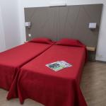Slide Bedroom with two single beds in an apartment of the Sokoburu residence in Hendaye