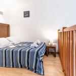 Slide Chambre lit double en mezzanine dans les appartements 8 personnes aux Rives Marines