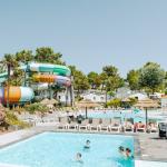 Slide Heated indoor and outdoor pools designed for both children and adults at Tropicana Campsite in Saint-Jean-de-Monts, Vendée